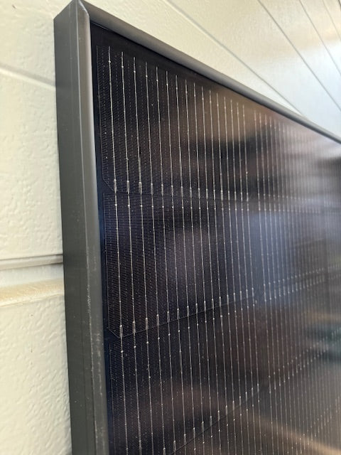 Close-up of JA Solar 440W FullBlack bifacial solar module, showcasing its sleek design and advanced technology.