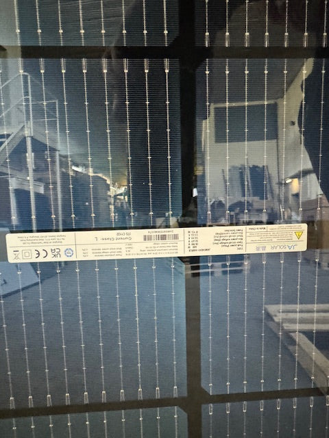 JA Solar 440W FullBlack bifacial solar panel JAM54D41 LB with label showing specifications