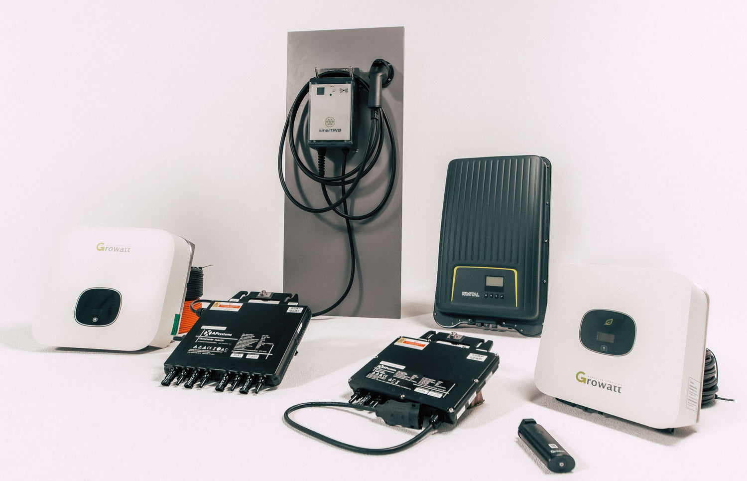 Collection of Growatt solar inverters and accessories for photovoltaic systems.